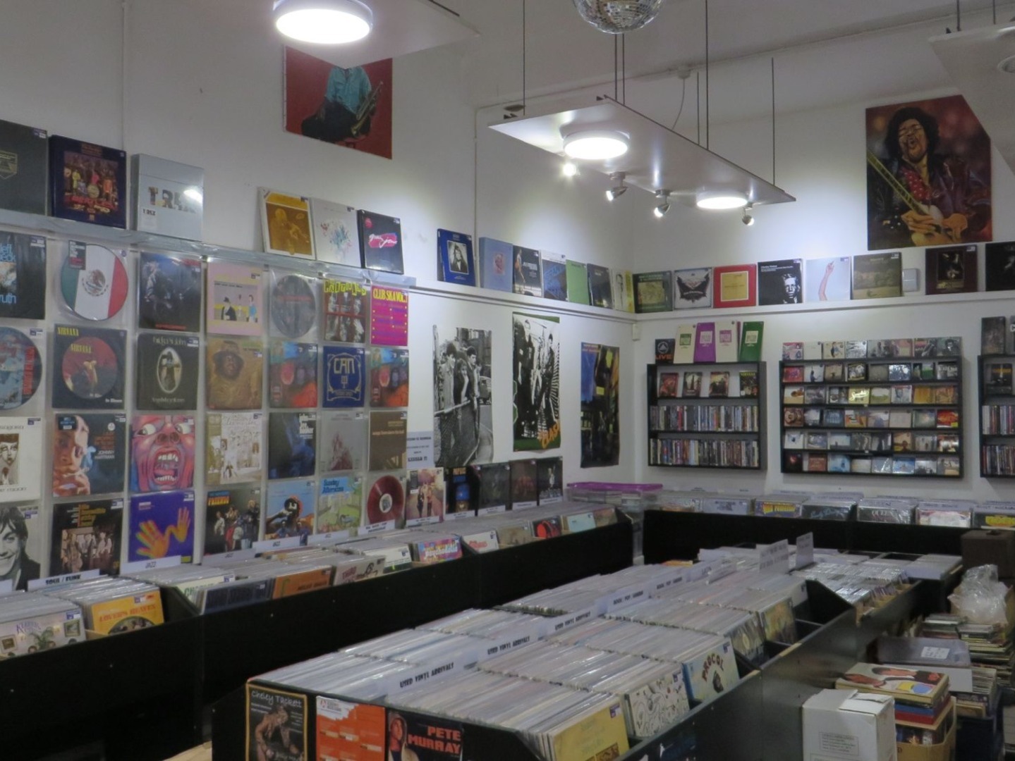 Used LP shelves at Rooster Records, Exeter, with hand-picked second-hand vinyl in at least excellent condition